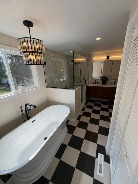 Modern bathroom with freestanding tub and shower
